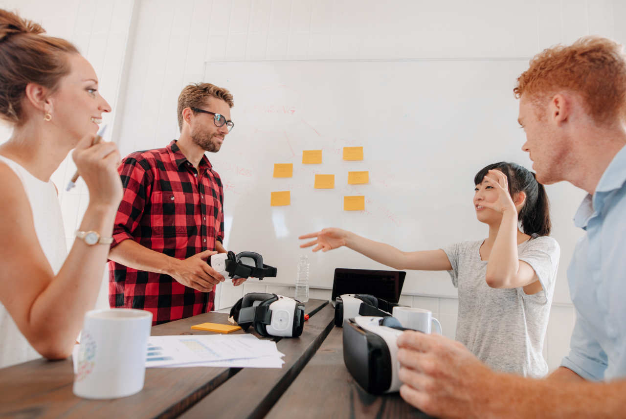 Business people discussing virtual reality technology